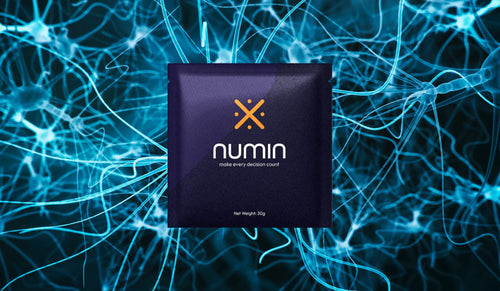 Brain fog supplement by Numin displayed against a vibrant background of interconnected glowing blue neural pathways