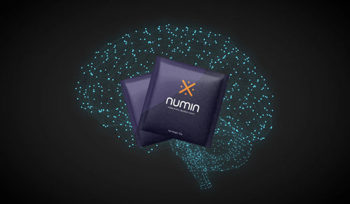 Brain health supplement sachets by Numin displayed over a glowing neural network in the shape of a brain