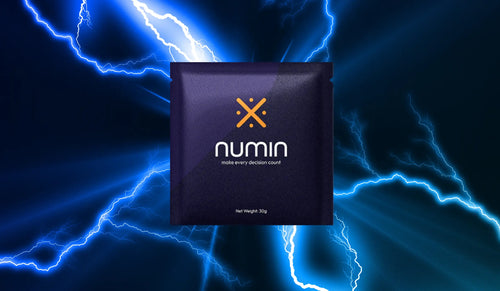 Cognitive supplement stick pack from Numin set against a dramatic blue lightning background to convey mental energy.