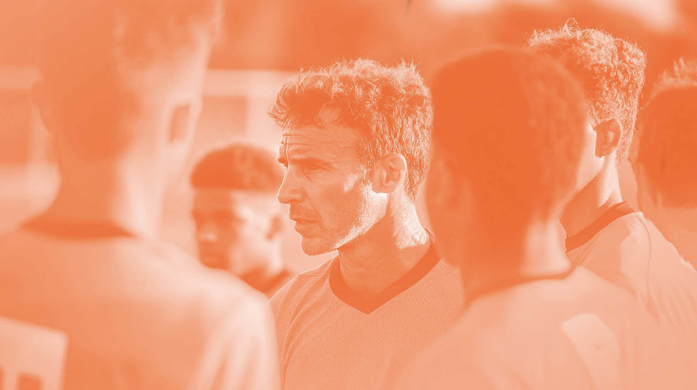 Middle-aged man in orange-tinted photo appearing thoughtful, representing decision fatigue research concepts