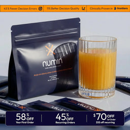 Numin nootropic supplement package with orange drink in glass showing cognitive enhancement product